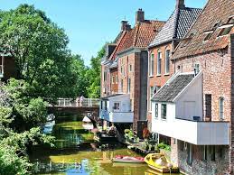 From middle dutch appengadomme, appengadamme, perhaps from a dam on a stream called appe. Appingedam