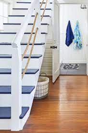 Blue Painted Staircases With A Coastal Nautical Beach Vibe Beach House Interior Design Painted Staircases Beach House Design