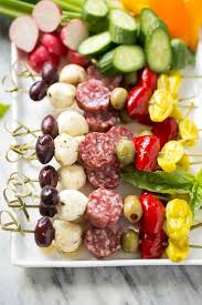 Pop a stick into each cheese ball and serve atop dried apple slices. Antipasto Skewers Dinner At The Zoo