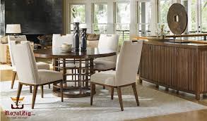 For sale a modern and stylish beautility extending dining table solid ash wood complete with four spindle back chairs all with a salmon coloured fabric seat pad. Cobham Modern Luxury Dining Table Royalzig