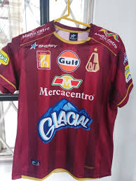 It was named after a native priestess yulima who was killed by the first conquistadors. Deportes Tolima Home Football Shirt 2017