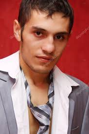 Young sexy boy in coat — Stock Photo © AndreySt #1129506