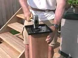 Place the base, load transfer plate and nut on the anchor bolt. Small Backyard Deck Part7 Installing A Titan 6x6 Post Anchor Youtube
