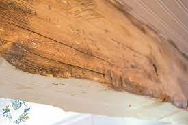 Distressed wood can bring your rooms a rustic aesthetic. Reclaimed Wood Beam Diy With New Wood The Weathered Fox
