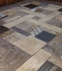 Custom Mosaic Floor Created From Remnant Tile Pieces Found At The Restore Stone Look Tile Diy Flooring Tile Floor