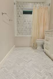 Marble herringbone shower floor tile. Grey Marble Tile In Herringbone Pattern On Floor Grey Marble Hexagon Tile On Shower Wall Bathroom Inspiration Grey Trendy Bathroom Tiles Bathroom Shower Walls
