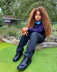 The boy is a model and famous because of his very long hair. Meet 8 Years Old Ghanaian Boy With The Longest Hair In The World Photos