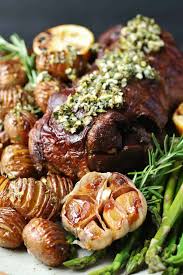 Seal a leg of lamb in a parcel then roast it long and slow with garlic, lemon, herbs and potatoes to soak up the delicious juices. Slow Roasted Boneless Leg Of Lamb Noshing With The Nolands