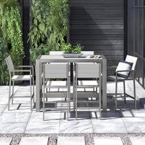 Bar tables can measure 37 to seat a few people or stretch to 73 to comfortably fit a full patio bash. Modern Contemporary Bar Height Pub Table Set Allmodern