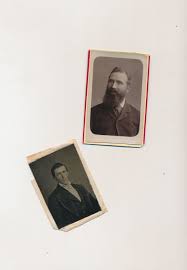 2 antique miniature mounted photos, one is a tintype