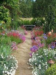 Plan your path width to the full brick, then add a few inches to the width of your excavation for wiggle room for the slightly wider spacing needed on a curve. 01 Stunning Small Cottage Garden Ideas For Backyard Landscaping Homekover English Garden Design Country Garden Design Small Cottage Garden Ideas