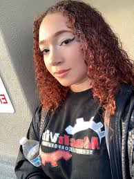 Introduction of a new member from Atlanta in a lesbian community