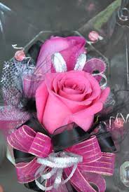 For a more classic look, la femme offers a great selection of baby pink and light pink prom dresses. Hot Pink Rose Prom Corsage With Black And Silver Accents Corsages Prom Flowers Pinterest