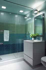 These Creative Bathrooms Prove The Power Of Blue And Green Tile Bathroom Design Inspiration Blue Shower Tile