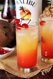 Throw a few ice cubes in a tall glass and pour in 3 oz of orange pineapple juice with 2 oz of malibu (or you can also try other coconut rum brands including don q coco, ricardo, parrot bay, calico jack, koloa, etc.), ½ oz sangria. Malibu Cocktail Malibu Coconut Rum 750 Ml Buzz Buddy Liquor Sherz Pink Wall