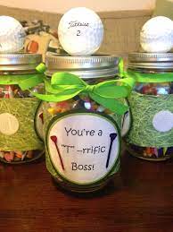 An exceptional bosses day gift to an amazing leader! National Boss Day Gift The Mason Jars Are Filled With Golf Tees All I Needed Was Some Scrapbook Pape Bosses Day Gifts Golf Birthday Gifts National Bosses Day