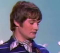 Is Creed from The Office in The Grass Roots band photos?