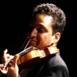 ADRIAN JUSTUS, Violin Solista.