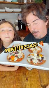 Filmed last week before I hit the road but I do get to join my lil’ family  tonite in Houston w/ Vallejo 🫶🏼 These mini-pizzas made from leftover  veggie/meat/cheese backstage trays were freakin’ ...