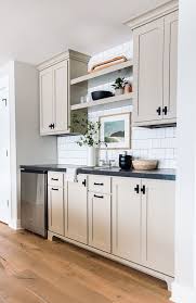 Putty Colored Cabinets And Cabinet Painting Tips The Lilypad Cottage In 2020 Beige Kitchen Beige Kitchen Cabinets Taupe Kitchen Cabinets