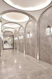 Sixteen Escalators Clad With Nickel Bronze Now Feature In The Entrance Hall Of London Department Store Harrods A Corridor Design Lobby Design Entry Way Design