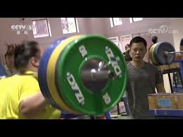 For faster navigation, this iframe is preloading the wikiwand page for li wenwen. Chinese Weightlifter Li Wenwen And Her Small Coach Youtube