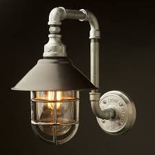 Industrial pipe wall sconce in black finish with valve and pressure gauge accent, 4 lights. Pin On Exercise