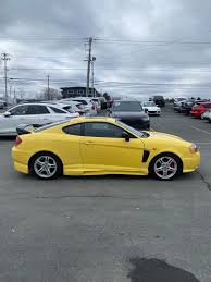 Image result for Sunny Yellow 2004 Tiburon