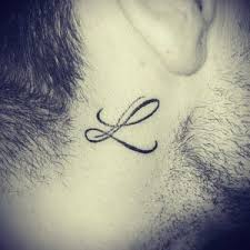 From a distance, you would think that the guy has two feathers hanging from his ear. 65 Amazing L Letter Tattoo Designs And Ideas Body Art Guru