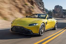 The current version of the aston martin logo contains a green rectangle on top of the white wings, sporting the company's name in uppercase characters. Aston Martin 2021 Lineup Models And Changes Overview Motor Illustrated