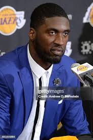 Shane Larkin of the Brooklyn Nets signs his contract before attending...  News Photo