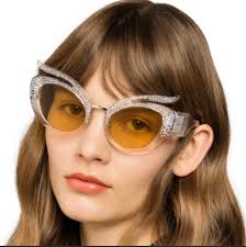 MIU MIU irregular sunglasses tetail 900