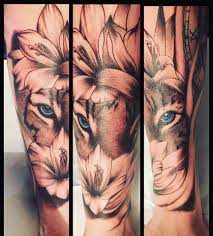 Tiger Eyes And Flowers Tattoo Tigertattoo Tigerandflowerstattoo Tiger Eyes Tattoo Flower Tattoo Sleeve Flower Forearm Tattoo Half Sleeves