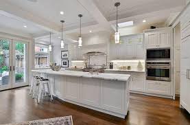 A bright kitchen with a unique white kitchen island. L Shaped Kitchen With Island Design Ideas Designing Idea