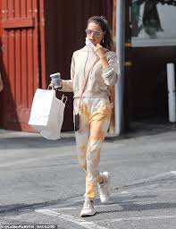 Jeans tie & dye tie dye shirts diy tie dye white jeans how to dye jeans denim jeans shibori details: Alessandra Ambrosio Keeps It Casual In Orange Tie Dye Sweatpants 247 News Around The World