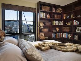 This tiny bedroom alcove was transformed into a cozy sleeping nook with a clever use of patterned upholstery, playful hues and simple storage solutions. Bedroom Corner Decorating Ideas Photos Tips