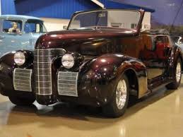 Image result for Trojan Maroon 1939 Oldsmobile
