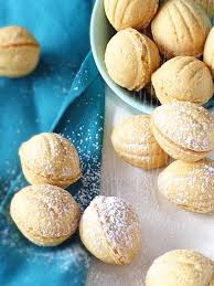 Combine cream cheese, butter, and vanilla in a large bowl. Walnut Shaped Cookies With Dulce De Leche Filling Oreshki Olga In The Kitchen