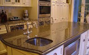 Soffit over hood creates a termination for the tile backsplash in this kitchen with 10' ceilings. Kitchen Cabinet Counter Tops Types Solid Top Sdn Bhd