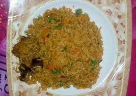 Cook rice or use leftovers: How To Make Any Night Of The Week Jollof Rice Garnish With Green Pepper Green Peas And Carriot Sigma Bread