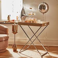 Admittedly, tray tables by design do look very similar. Tall Butler Tray Stand
