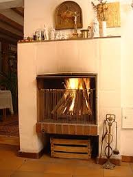 Operating the fireplace with the damper partially closed will not generate more heat. Fireplace Wikipedia