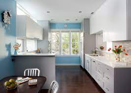 Neutral colors plucked from nature—including buttery cream, grassy green, and pale pink—and organic details boost warmth and interest in kitchens equipped with pale blue kitchen. Grey Cabinets Blue Walls Houzz
