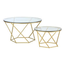 This is a classic take on the reliable round glass table and works quite well in any modern setting. Walker Edison Furniture Company 2 Piece 28 In Gold Medium Round Glass Coffee Table Set With Nesting Tables Hdf28clrgggd The Home Depot