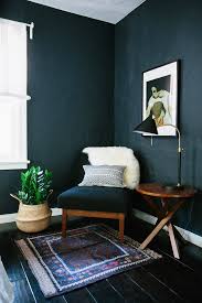 An abstract artwork brings a splash of colour to the bedroom's black feature wall in this byron bay. Why Dark Walls Work In Small Spaces Design Sponge