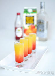Tequila cocktails can take on a variety of flavors. Tropical Tequila Sunset Shooter Shooters Alcohol Recipes Fruity Drinks Shooters Alcohol