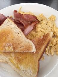 Scrambled Eggs On Toast With Bacon Picture Of Cafe Venice Maroochydore Tripadvisor