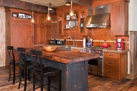 The most charming about rustic kitchen cabinets is that it brings the countryside style into the kitchen. Impressive Denver Orange Kitchen Cabinets Rustic Kitchen Rustic Counter Stools Wood Drawers Integrated Appliances Mesquite Top