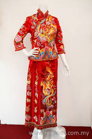 A traditional malaysian welcome ceremony with bunga manggar and kompang. Traditional Chinese Qun Kwa Dress