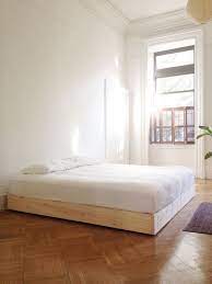 my floating diy platform bed in unfinished pine although i am thinking about painting a dark raisin brown simple bed frame diy platform bed bedroom furnishings